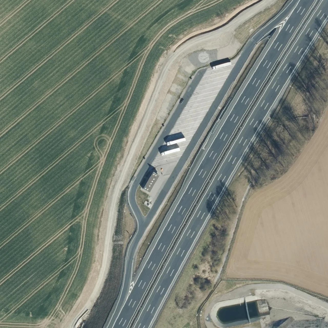 Aerial photo (orthophoto) of truck parking Wetterschacht West (RA A7 km 229,6 W) from 2025