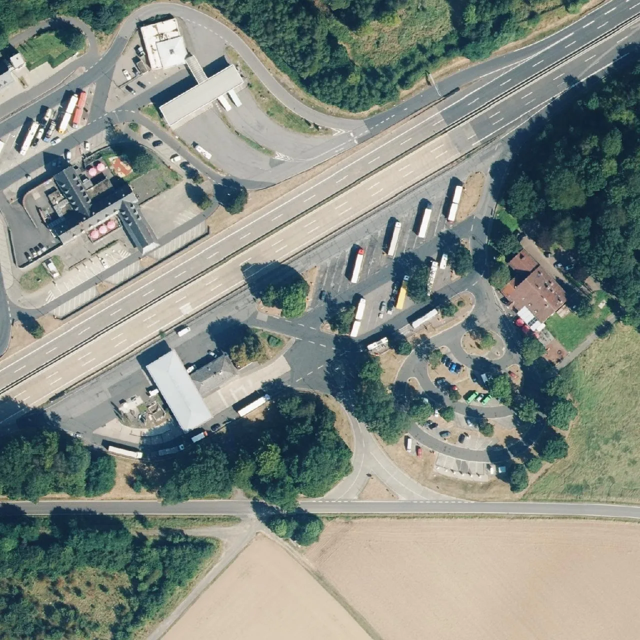 Aerial photo (orthophoto) of truck parking Reinhardshain Süd from 2024