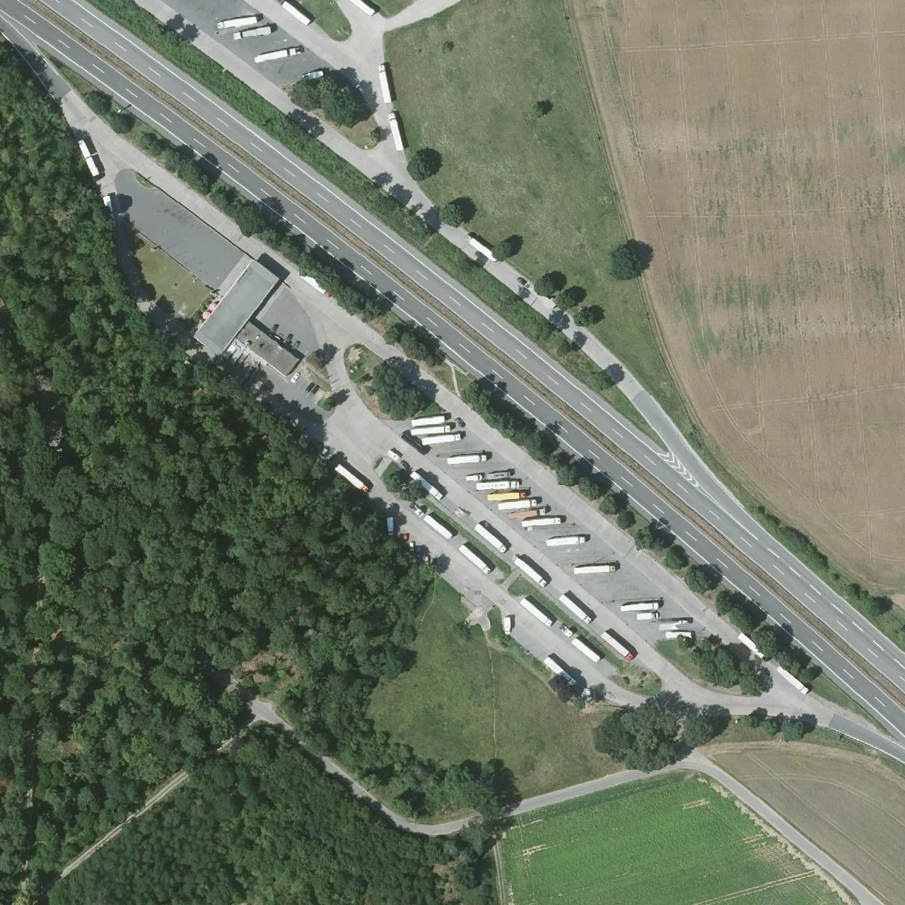Aerial photo (orthophoto) of truck parking Büttelborn West from 2023