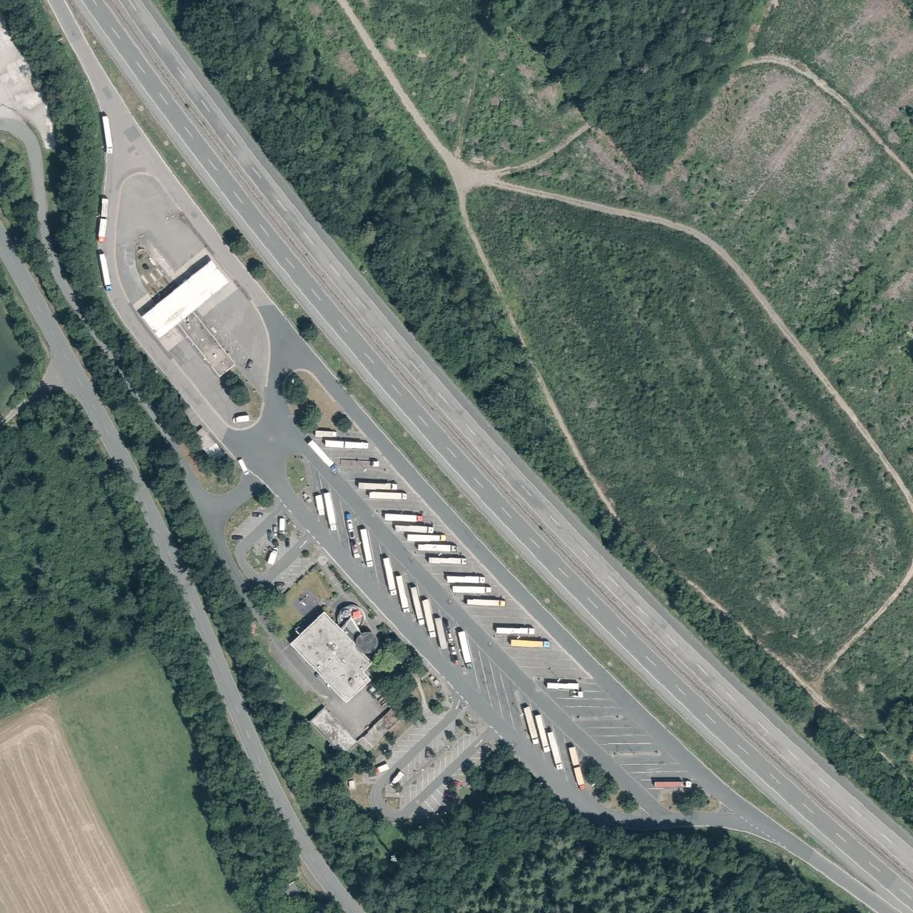 Aerial photo (orthophoto) of truck parking Siegerland (West) from 2023