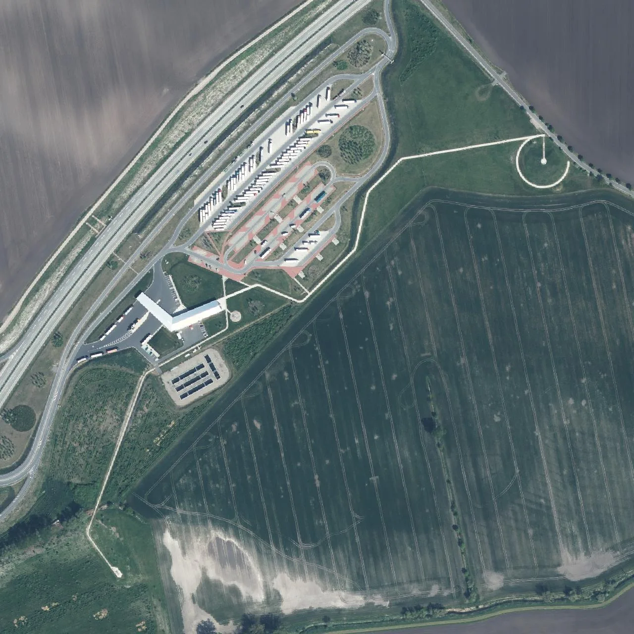 Aerial photo (orthophoto) of truck parking Leubinger Fürstenhügel from 2024