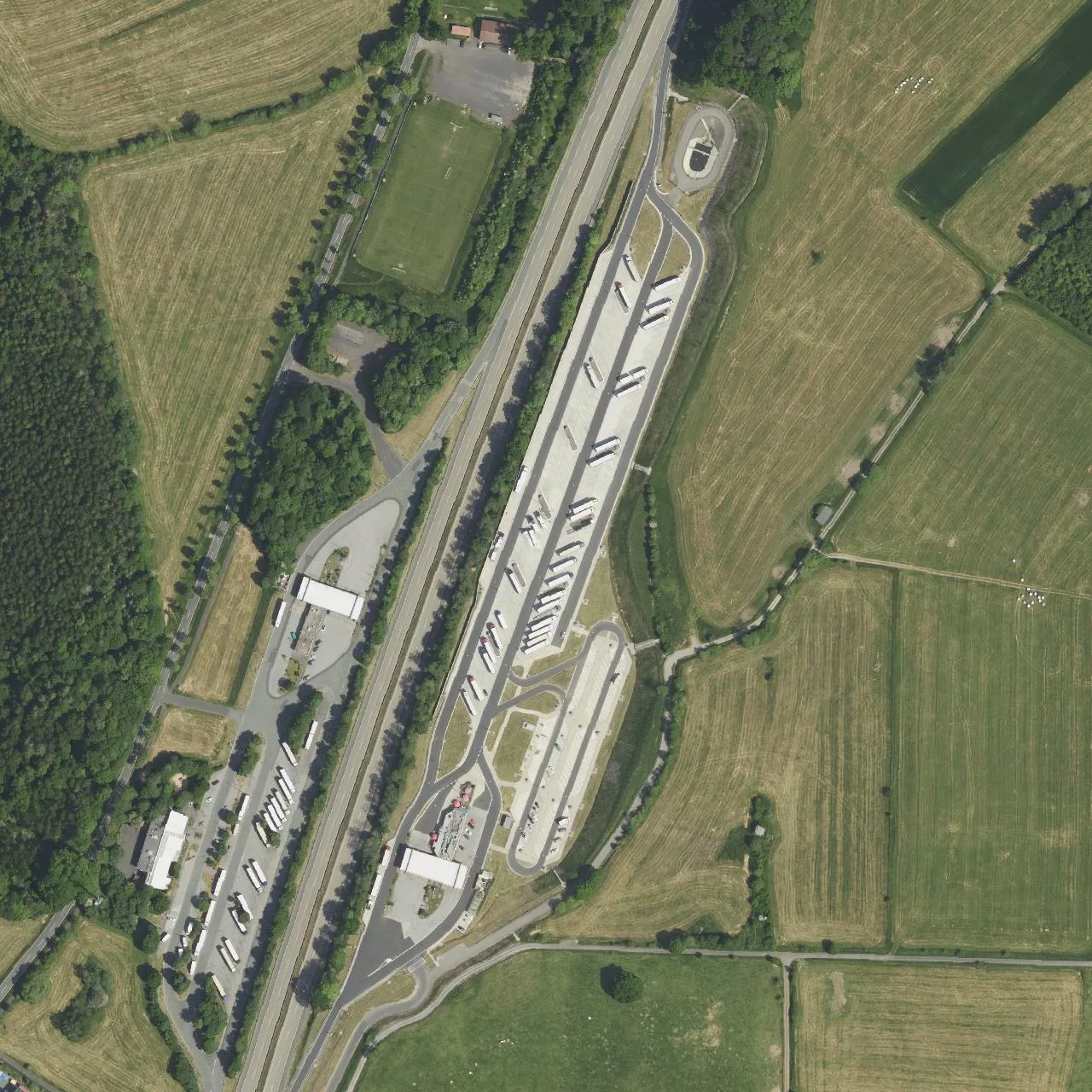 Aerial photo (orthophoto) of truck parking Uttrichshausen Ost from 2023
