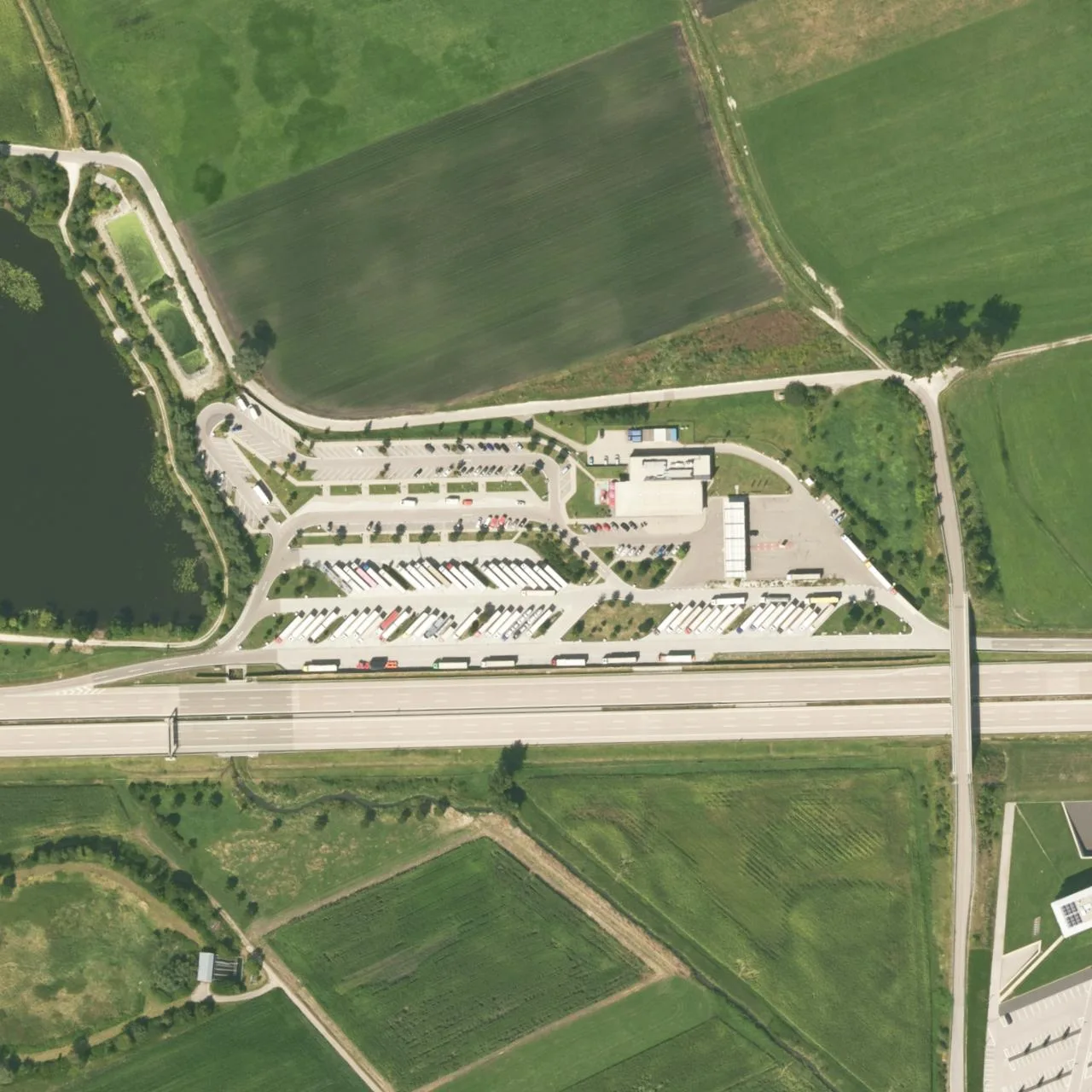 Aerial photo (orthophoto) of truck parking Burgauer See Nord from 2022