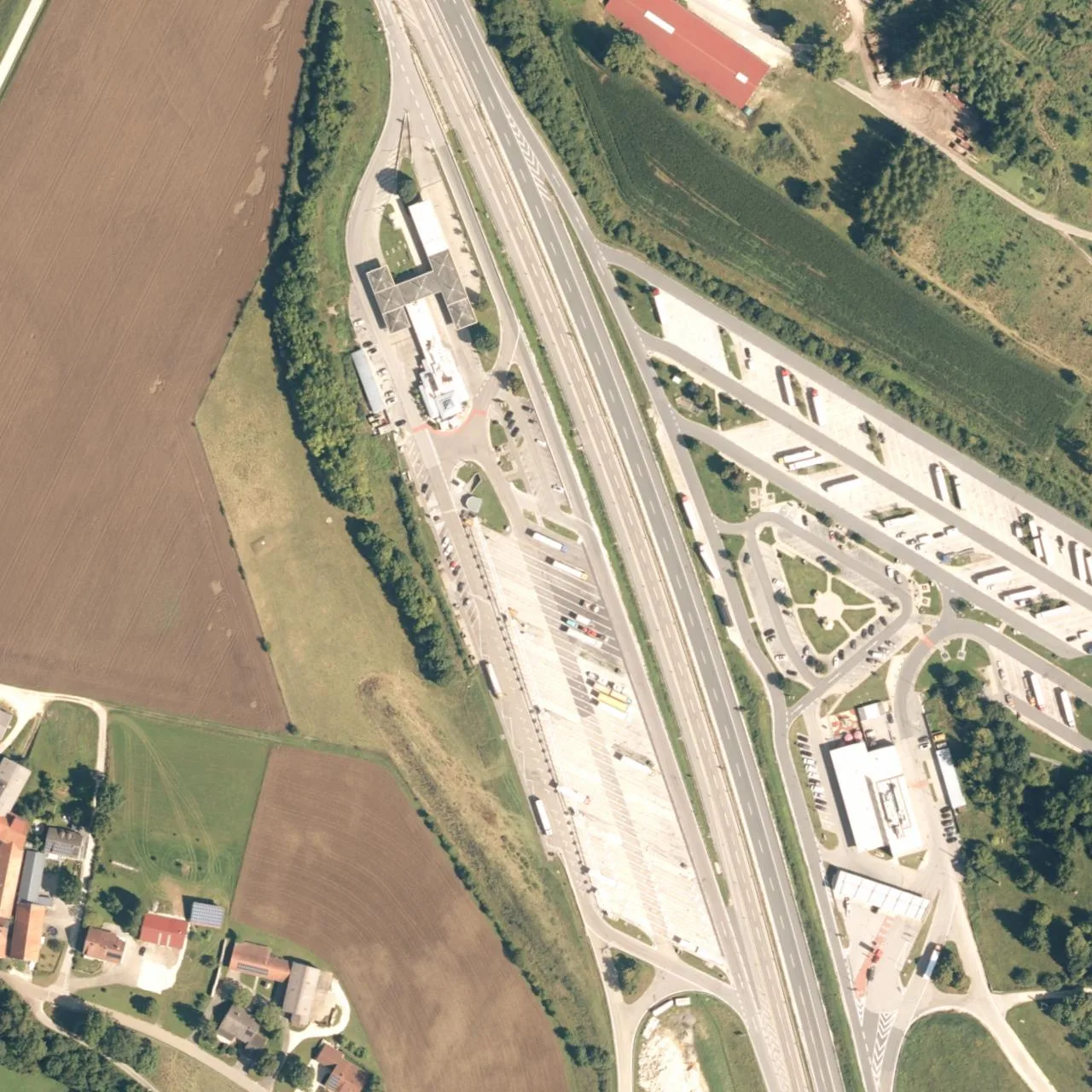 Aerial photo (orthophoto) of truck parking Jura West from 2025