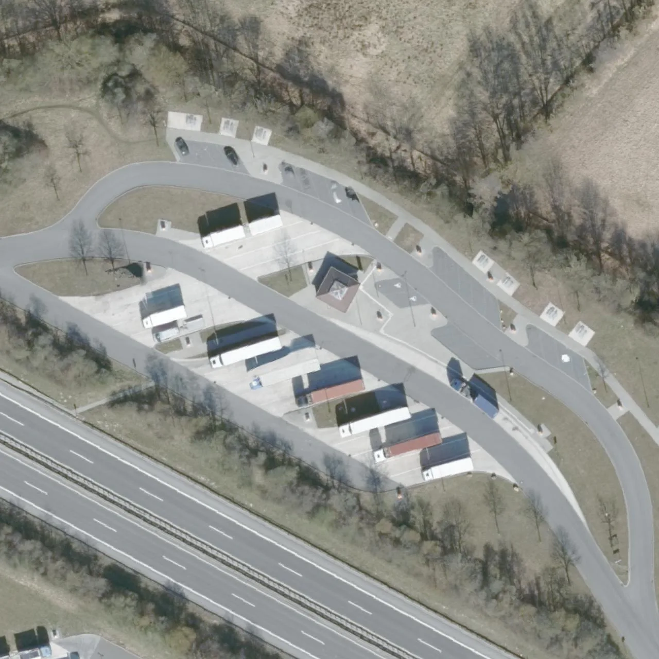 Aerial photo (orthophoto) of truck parking Grevelau (Scharmbeck) Nord from 2024