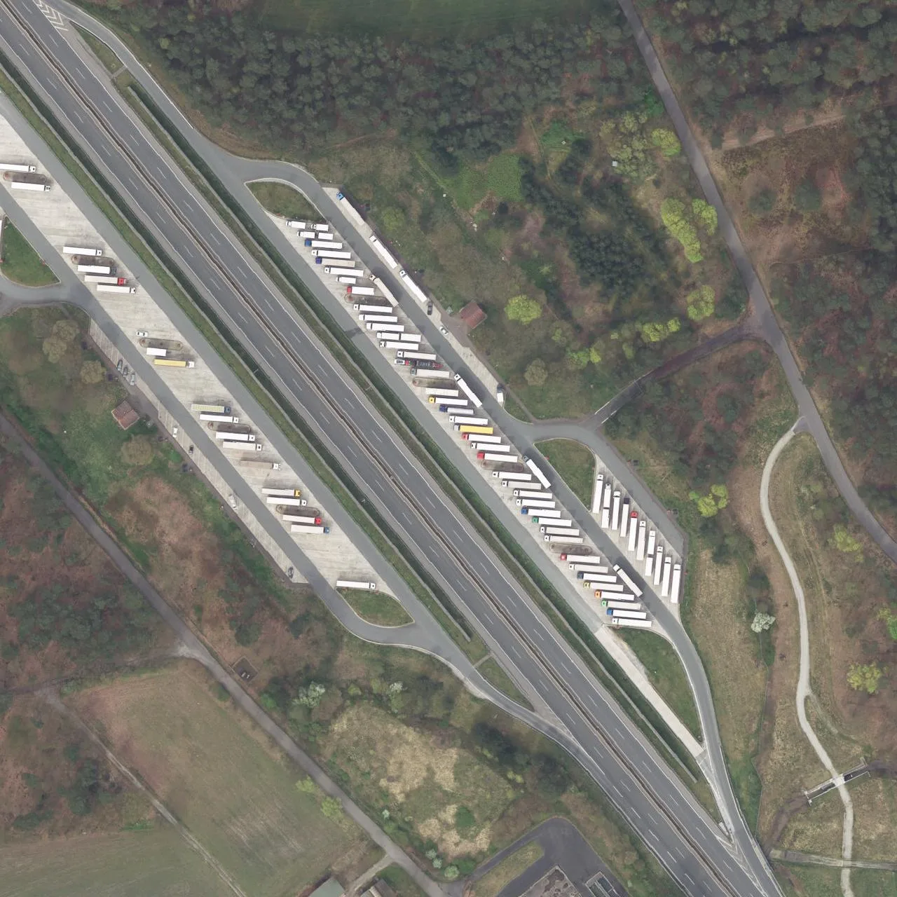 Aerial photo (orthophoto) of truck parking Hövelsenne (West) from 2024