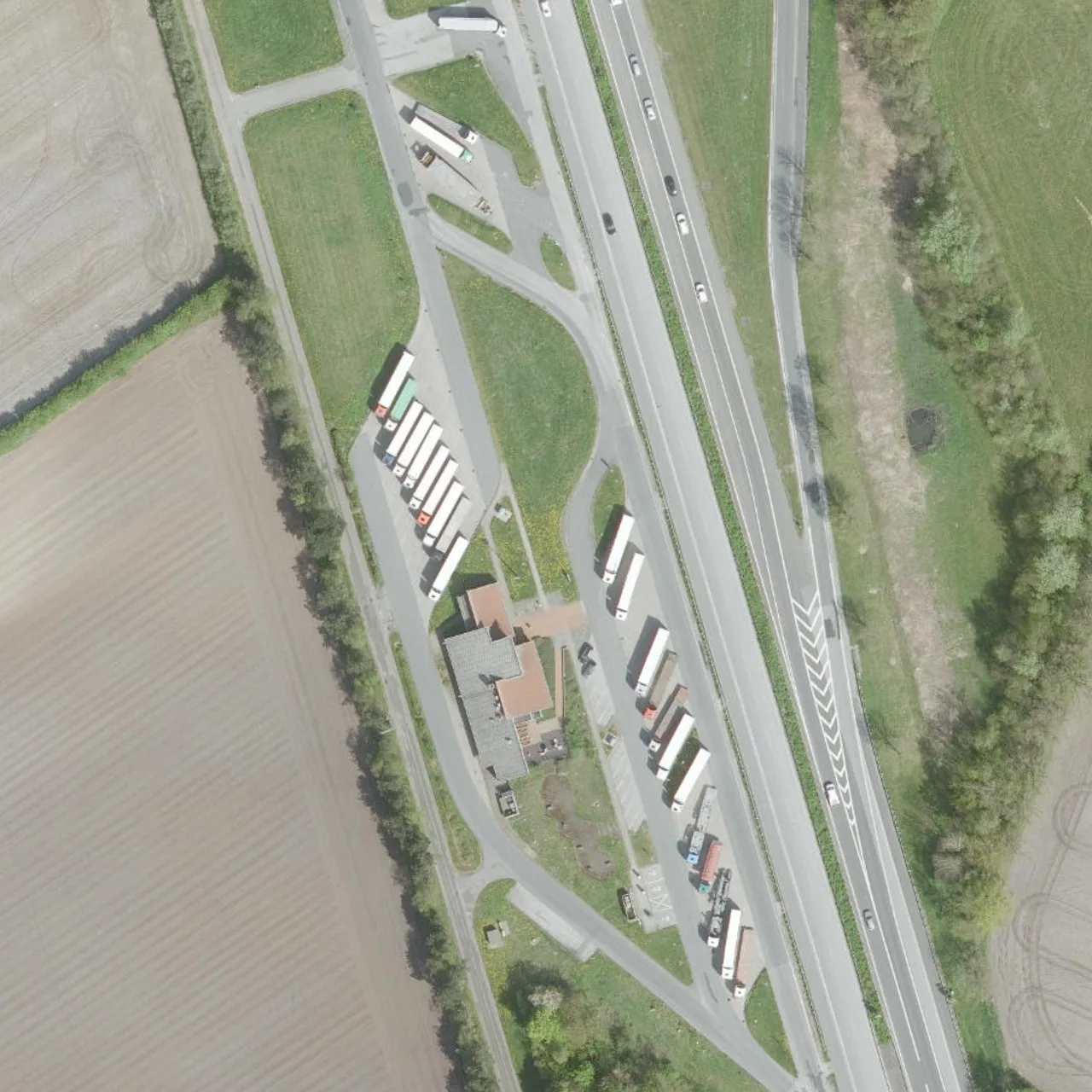 Aerial photo (orthophoto) of truck parking Ellund West from 2024