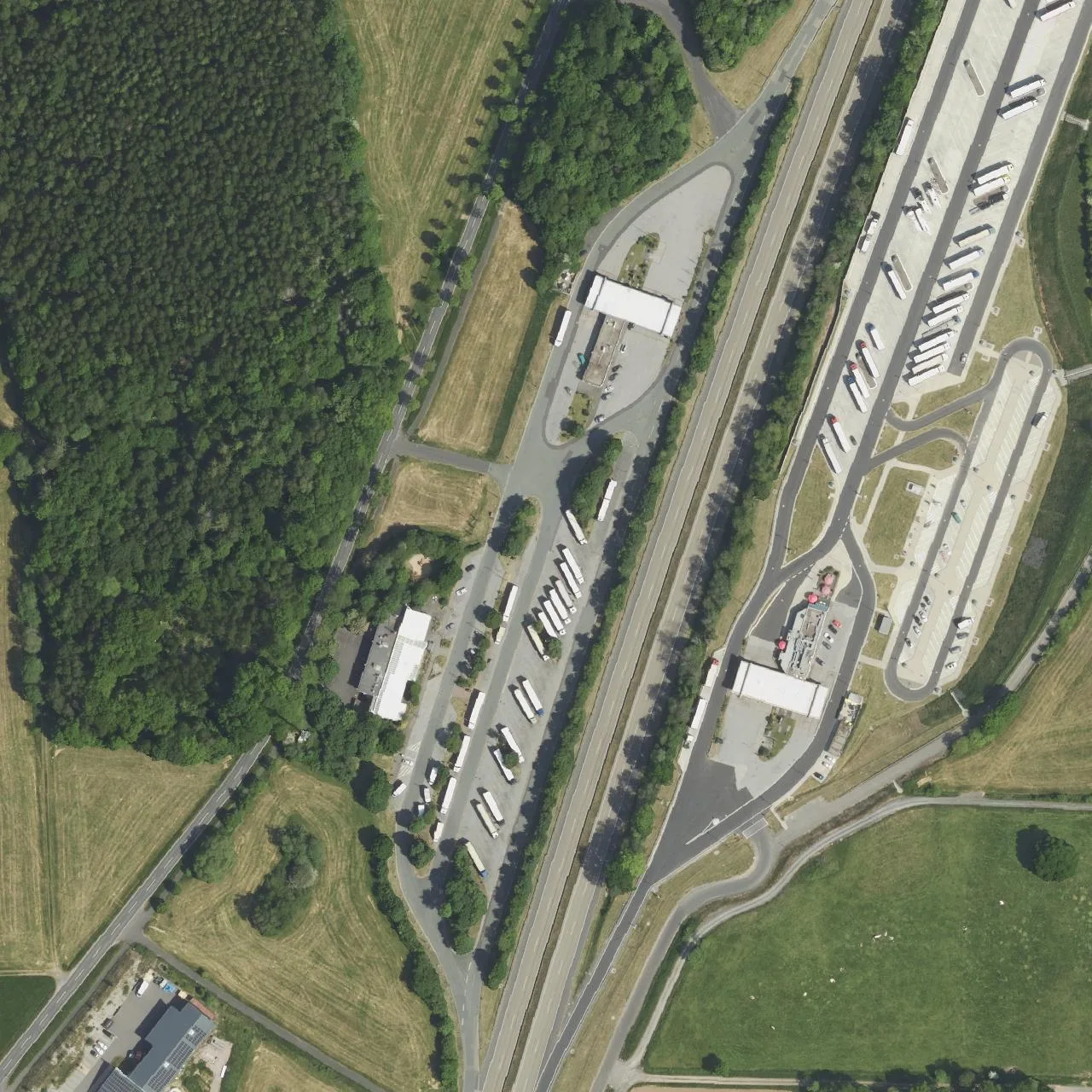 Aerial photo (orthophoto) of truck parking Uttrichshausen West from 2023